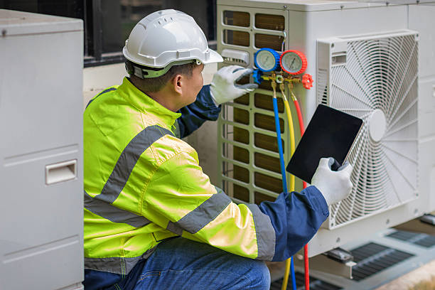 Professional Hvac technician working in Springfield, MI